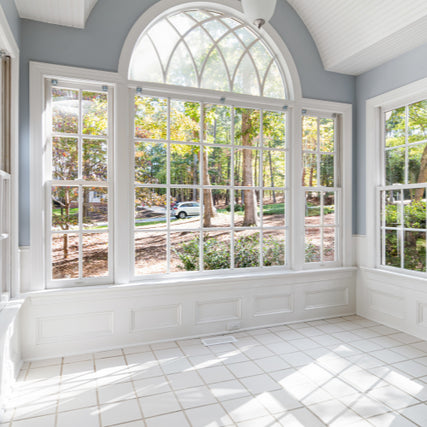 WindowsLarge interior windows inside of a home.
